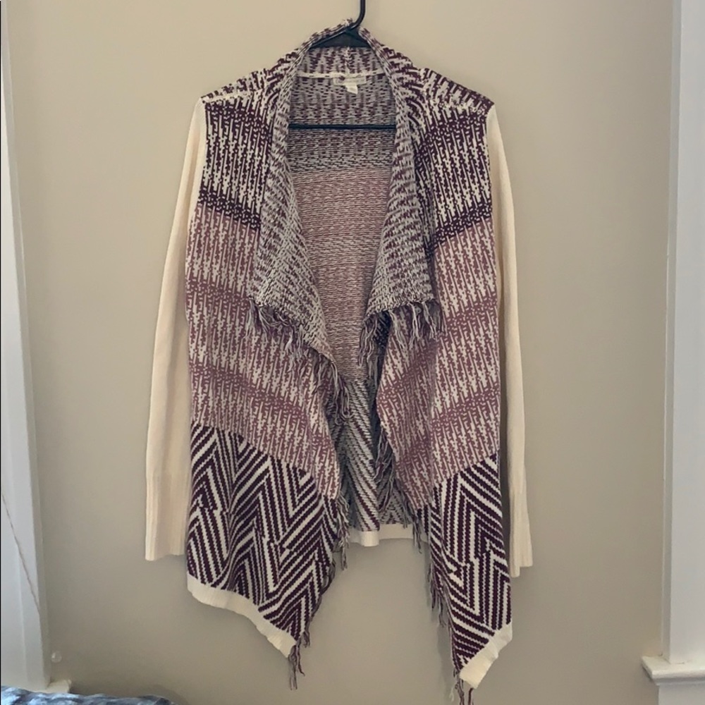Asymmetrical boho cardigan with fringe detail!